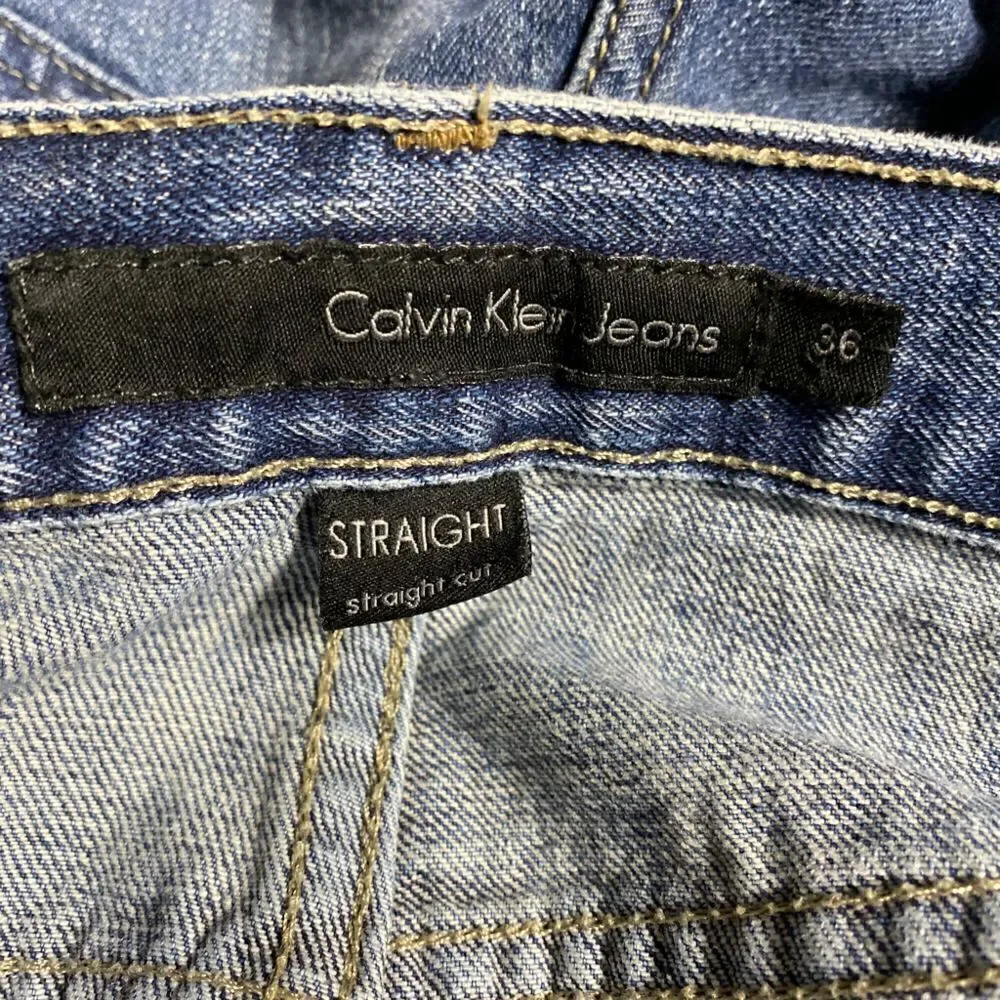 Calvin Klein Straight Cut Distressed Jeans - Picture 3 of 5
